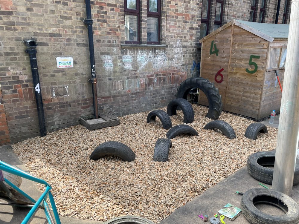 Bark chippings laid across a play area by Apex Landscapes